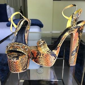 Ultra-platform snakeskin sandals